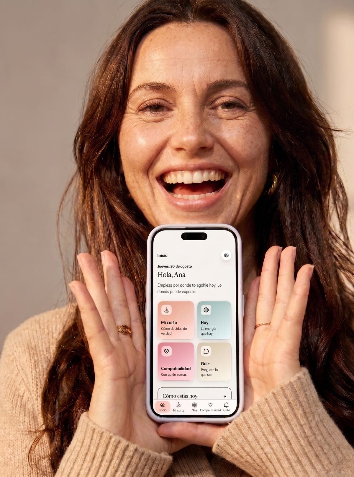 An Innerify user showing her chart on her phone